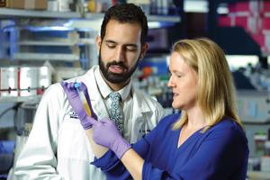 Two medical professionals in a lab