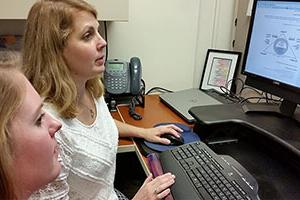 nurses browsing computer screen