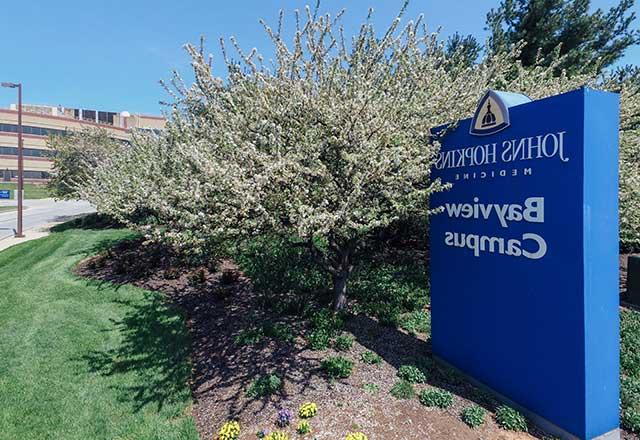 Bayview Campus sign in front of a parking garage