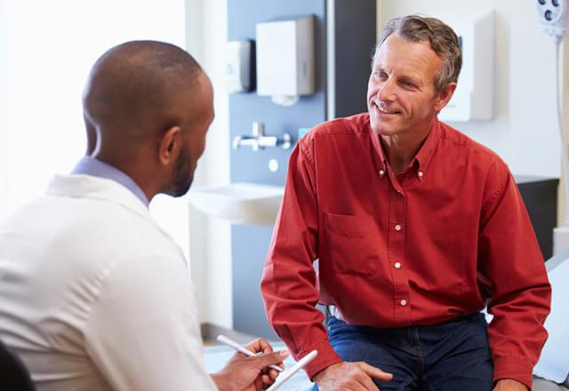 doctor talking with patient