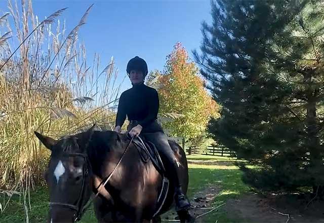 Anne riding a horse