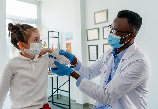 a pediatrician with child