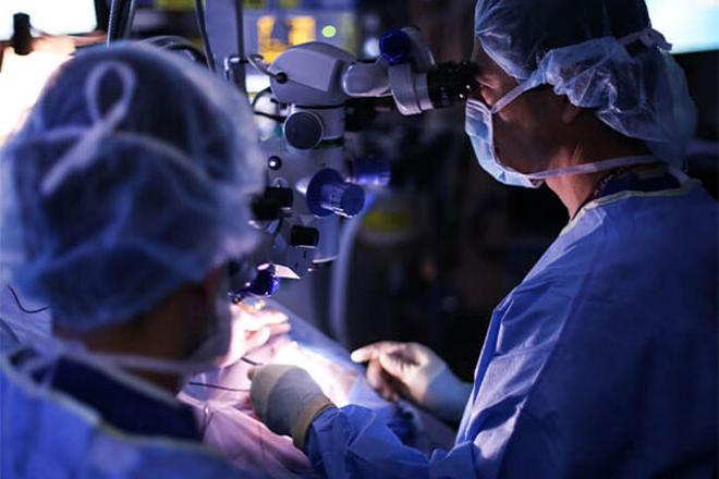 Dr. James Handa performs surgery on a patient at the Wilmer Eye Institute